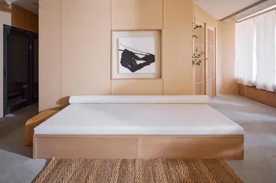 a bedroom with a large white bed in it at Tsubomi Shibuya in Tokyo