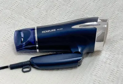 a hair dryer in a bottle on a table at \u30a2\u30b9\u30d4\u30a2405 7-minute walk from Nishi-Sugamo Station in Tokyo