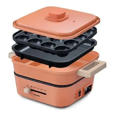 an orange suitcase sitting on top of two orange suitcases at sMS\u8db3\u7acb2\u4e01\u76ee in Tokyo