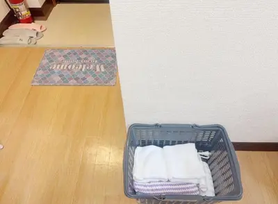 a basket of towels sitting on a wooden floor at 2F 3 minutes walk from Nishi-Oi Station, Shinagawa Ward, 4 stations available, surrounded by commercial streets, rich life, convenient transportation in Tokyo