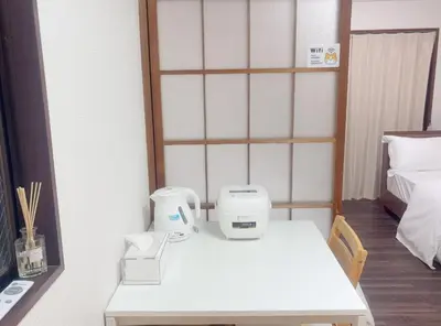 a room with a table with a coffee maker on it at 3F 3 minutes walk from Nishi-Oi Station, Shinagawa Ward, 4 stations available, surrounded by commercial streets, rich life, convenient transportation in Tokyo