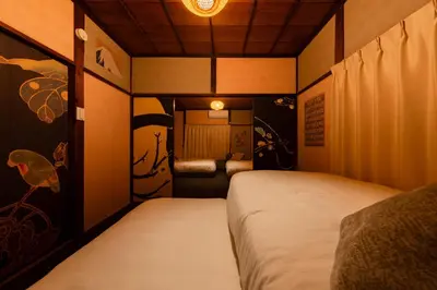 a small room with two beds in it at EDO GATEI Sakura Biyori Stay in Tokyo