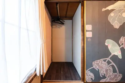 a room with a mirror and a window at EDO GATEI Sakura Biyori Stay in Tokyo