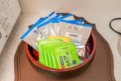 a basket filled with different types of items at Anzu 4 Bed rooms Villa 5 minutes walk from Keise line Edogawa station in Tokyo