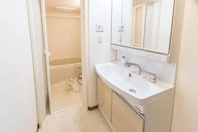 a bathroom with a sink and a shower at 3 Story Private House, 7 Min Walk to Yamanote Line Direct to Shinjuku, Ikebukuro, Shibuya in Tokyo