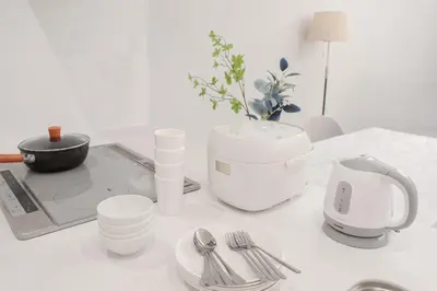 a counter top with a blender and utensils at Brand New Luxury Suite 7 min to Omotesando 2 min to Shibuya in Tokyo
