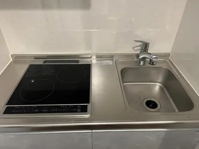a stainless steel sink with a microwave in it at \u30af\u30ea\u30aa-\u30e9\u30e2\u30fc\u30c9\u5927\u68ee in Tokyo