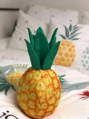 a pineapple sitting on top of a bed at Shinjuku Y HOTEL II 1 minute to 7-Eleven 6DK 2 bathrooms in Tokyo