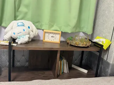 a table with a stuffed animal and a clock on it at \u548c\u98a82\u897f\u5317\u53e3 in Tokyo
