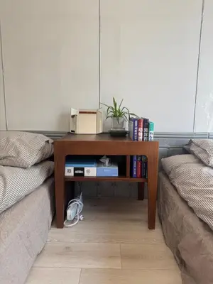 a living room with a table next to a couch at \u548c\u98a82\u897f\u5317\u53e3 in Tokyo