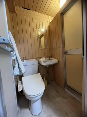 a small bathroom with a toilet and a sink at \u548c\u98a82\u897f\u5317\u53e3 in Tokyo