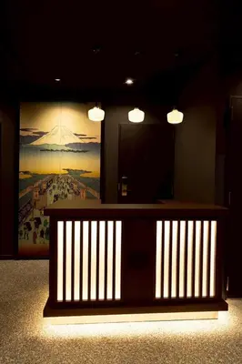a room with a large painting on the wall at Hotel Matsunoi Shurin in Tokyo