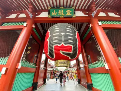 an entrance to a building with an elephant sign at Stay Master Hotel in Tokyo