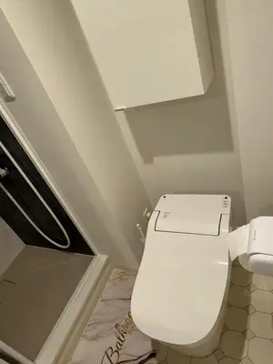 a bathroom with a white toilet in a room at 5minutes from Shinjuku Shin-Okubo Station-k203 in Tokyo