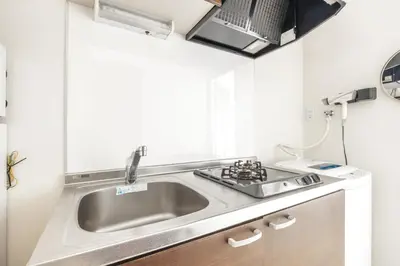 a kitchen with a sink and a stove at \u677f\u6a4b\u533a yuga house\u99c5\u8fd1102 in Tokyo