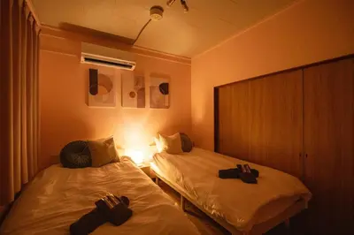 a room with two beds in a hotel room at 25\u5e74\u30d5\u30eb\u30ea\u30ce\u30d9 7\u6708\u65b0\u30aa\u30fc\u30d7\u30f3 \u6700\u59278\u4eba \u8cb8\u5207 \u845b\u897f\u99c5\u5f92\u6b6912\u5206 3\u30d9\u30c3\u30c9\u30eb\u30fc\u30e0 46\u5e73\u7c73\u3067\u3054\u5bb6\u65cf\u6700\u9069 in Tokyo