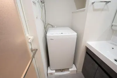 a small bathroom with a toilet and a sink at Daffitto\u672c\u6240\u543e\u59bb\u6a4b in Tokyo