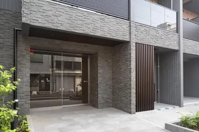 an external view of a building with glass doors at Daffitto\u672c\u6240\u543e\u59bb\u6a4b in Tokyo