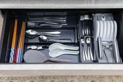 a drawer filled with silver utensils and utensils at Hotel-Like Simmons Bed Couple Disney Shinjuku in Tokyo