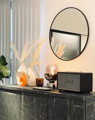 a mirror sitting on top of a black dresser at Alo BnB 11 - Near Roppongi, Ginza, Shinjuku, Shibuya - Self check-in in Tokyo