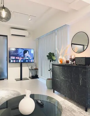 a living room with a tv and a glass table at Alo BnB 11 - Near Roppongi, Ginza, Shinjuku, Shibuya - Self check-in in Tokyo
