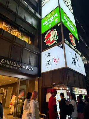 a group of people standing outside of a building at Liotta SHINBASHI A 7 beds, 7-minute walk from Shimbashi, up to 11 people in Tokyo