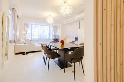 a kitchen and dining room with a table and chairs at Liotta SHINBASHI A 7 beds, 7-minute walk from Shimbashi, up to 11 people in Tokyo