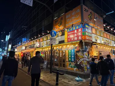 a group of people standing in front of a building at Liotta SHINBASHI A 7 beds, 7-minute walk from Shimbashi, up to 11 people in Tokyo