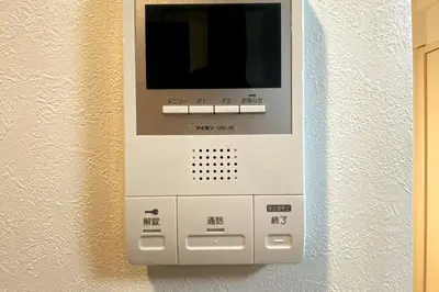 an electronic device is hanging on a wall at be\u30c6\u30e9\u30b9202 in Tokyo