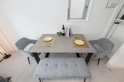a dining room table with chairs and a table and a table and chairsuggest at LIVCITY Kinshicho 201 in Tokyo