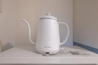 a white electric kettle sitting on top of a counter at LIVCITY Kinshicho 202 in Tokyo