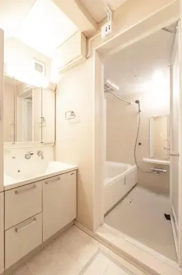 a white bathroom with a tub and a sink at NEW OPEN! 3bedroom house in Ikebukuro with a carp \u3048\u3060\u307e\u3081\u30a4\u30f3 in Tokyo