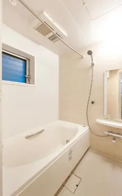 a white bathroom with a tub and a window at NEW OPEN! 3bedroom house in Ikebukuro with a carp \u3048\u3060\u307e\u3081\u30a4\u30f3 in Tokyo