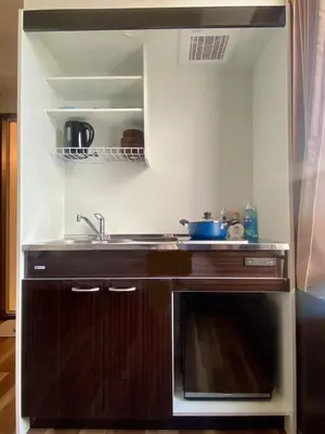 a kitchen with a sink and a stove at daren stay in Tokyo