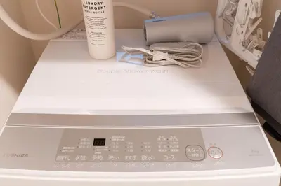 a box with a modem and a cup on a shelf at tai\u5357\u5143\u753a25 in Tokyo
