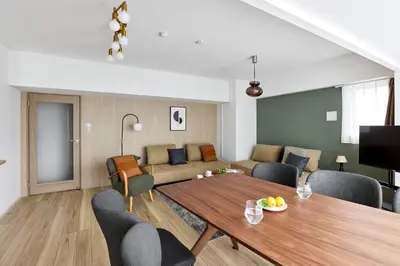 a living room with a table and a couch at Azabu artemis in Tokyo