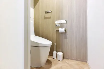 a bathroom with a white toilet in a stall at Azabu artemis in Tokyo