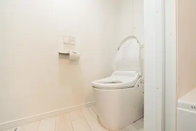 a bathroom with a toilet with the lid up at NDZ101 3 min walk to station, 2 lines, Yamanote Line, high-speed Wi-Fi in Tokyo