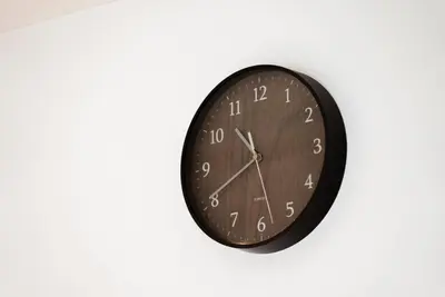 a black clock hanging on a white wall at NDZ101 3 min walk to station, 2 lines, Yamanote Line, high-speed Wi-Fi in Tokyo