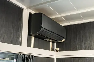 a flat screen tv hanging on a wall at AkebonoHouse103 in Tokyo
