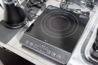 a laptop computer sitting on top of a counter at AkebonoHouse103 in Tokyo