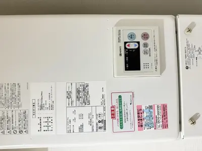 a refrigerator with a clock on the side of it at NDZ103 3 min walk to station, 2 lines, Yamanote Line, high-speed Wi-Fi in Tokyo