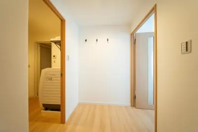 a hallway with a mirror and a door to a bedroom at Humming Kinshicho 303-202-301 - Vacation STAY 19264 in Tokyo