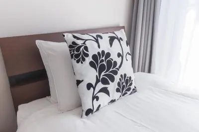 a pillow sitting on top of a bed at LANG HOTEL Kameido - Vacation STAY 79478v in Tokyo