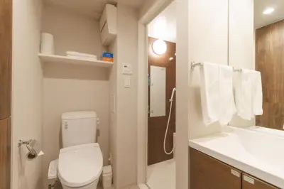 a bathroom with a toilet and a sink at LANG HOTEL Kameido - Vacation STAY 76961v in Tokyo