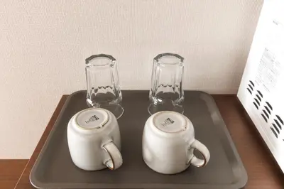 a tray with two glass vases and a tea set at LANG HOTEL Kameido - Vacation STAY 76836v in Tokyo