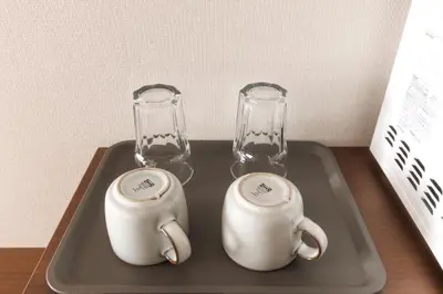 a tray with two glass vases on top of it at LANG HOTEL Kameido - Vacation STAY 79234v in Tokyo