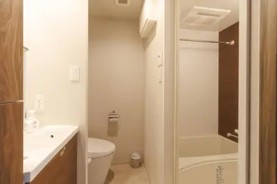 a small bathroom with a toilet and a sink at LANG HOTEL Kameido - Vacation STAY 79133v in Tokyo