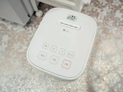 a white computer mouse sitting on a floor at Ilman Hishimo Mansion - Vacation STAY 19418 in Tokyo