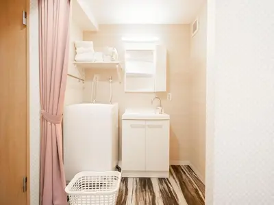 a small bathroom with a sink and a toilet at Ilman Hishimo Mansion - Vacation STAY 19432 in Tokyo